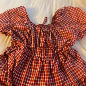 Plus Size Gingham tie front ruffle hem dress. Perfect for country concert